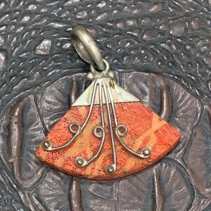 Elegant Silver and Orange Pendant